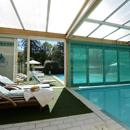 Готель Le Manoir Du Lys, The Originals Relais Bagnoles de l'Orne Normandie Екстер'єр фото