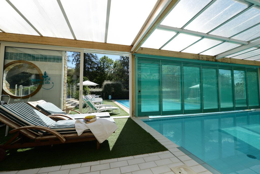 Готель Le Manoir Du Lys, The Originals Relais Bagnoles de l'Orne Normandie Екстер'єр фото